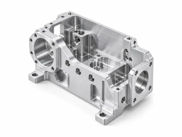CNC machined aluminum housing with milled pockets and bores