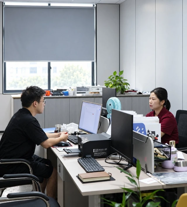 HM Manufacturing team collaborating in the office