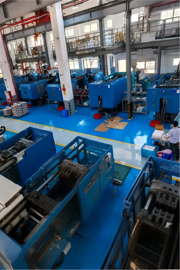 Injection molding workshop with rows of injection molding machines
